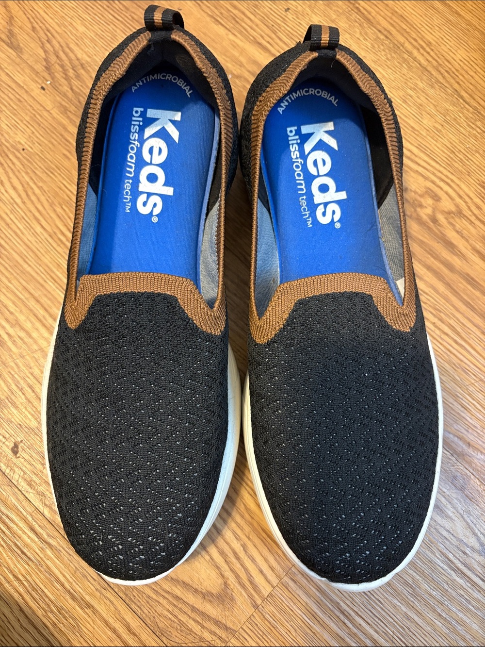 Keds Slip-On Sneakers in Black with Brown Trim and White Sole